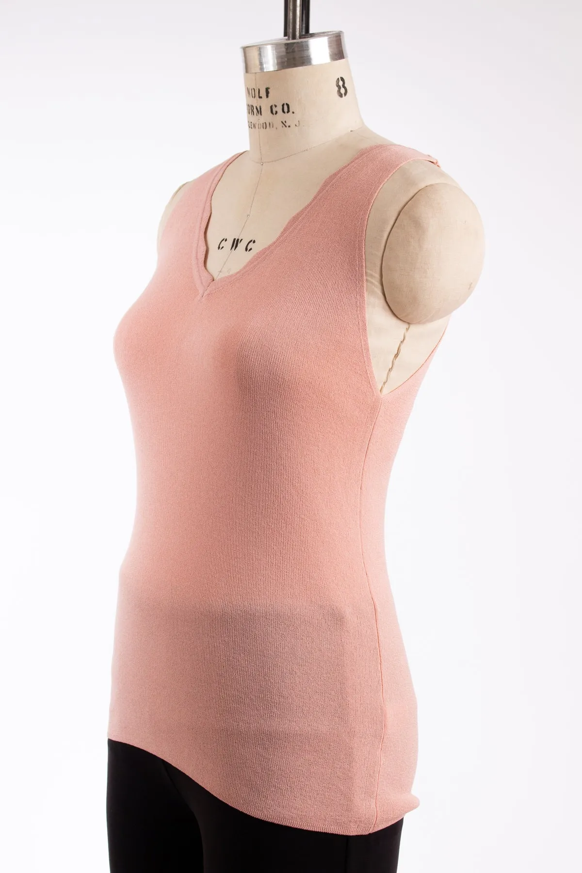 Pink Top with Scalloped Edges